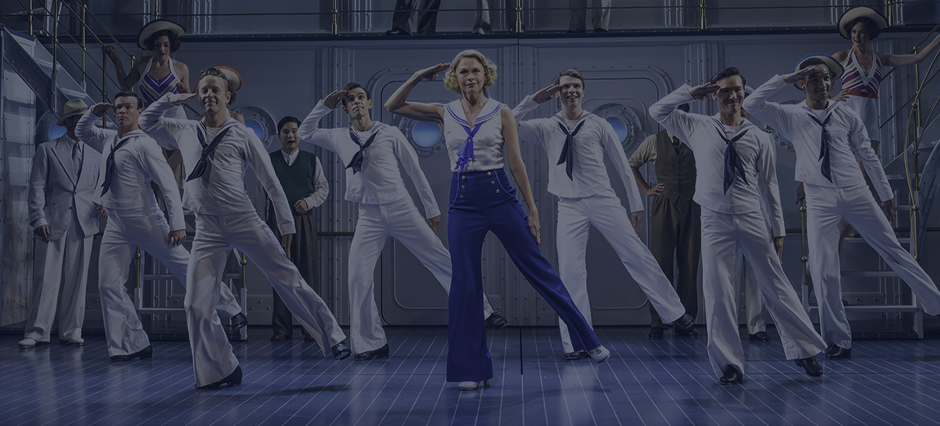 Blue tinted image of the performance of Anything Goes